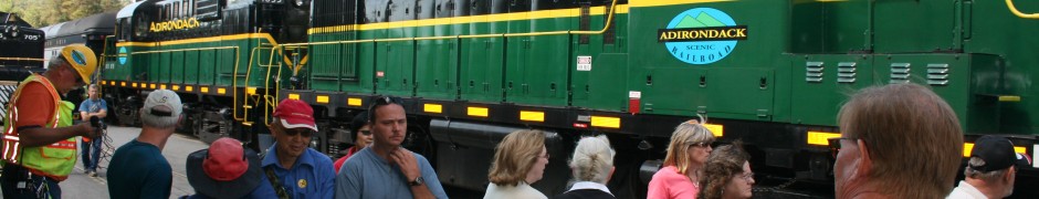 Passengers waiting to climb on board for a ride to Otter Lake on Saturday.