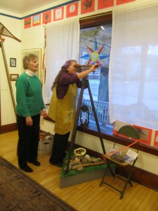 Deborah Evans and Kate Lewis check out turn of the 19th century surveying equipment