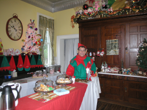 The elf himself, Jimmy Ortiz, prepares hot chocolate for Candy Land guests.