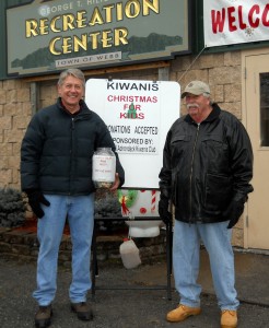 Kiwanis Members Chris Kraft on the left and Bob Stanton on the right offer the collection container to Snodeo visitors. Courtesy photo