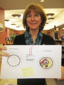 Librarian Kirstin Down with Emma Barrett's winning magnet design. Photo by Wende Carr