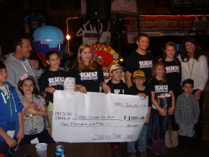 A Zippy Donation. The Cousins that Care present a $1,000 check to the Zipadellis. From left are: Greg and Ellie Zipadelli, Laura Levi, Shelby Townsend, Croy Hansen, Thomas Levi, Britney Levi, Nan and Gianni Zipadelli. Courtesy photo