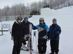 From left, Xpedition Outdoors Producer Chris Rolfe, Town of Webb Publicity Director Mike Farmer, Host Chris Lashomb, and Producer Roque Murray at McCauley Mountain. Photo by Dana Armington