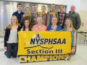 THE SECTION III NORDIC CHAMPIONS: Kneeling in front , from left are: Maddie Phaneuf, Allyson Brosemer, Olivia Phaneuf, Megan Greene, and Emily Greene. Back row from left, Adam Luban, Henry Uzdavinis, Tecwyn WIlliams, Eric Houck, Colin Criss, Tor Rudd, and Coach John Leach  