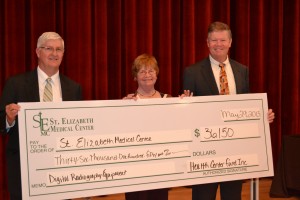 Hazel Dellavia, representing the Health Center Fund, Inc., awarded a check to St. Elizabeth's Medical Center toward the purchase of a new digital radiography equipment in Old Forge. From left, are Robert Scholefield, Hazel Dellavia, and Richard Ketcham. Courtesy photo
