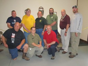 Completing the NRA course at White Otter were: Back row, L-R - Michael Masi, Charles Stephens, Howard LaFave, Walter Montgomery, Robert Hoffman and William Caldwell. Front row - Stephen Piseck, NRA Training Instructor David Roberts, and Paul Trzepacz. Courtesy photo