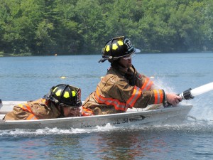 Members of the Eagle Bay Fire Dept shown competing in 2012