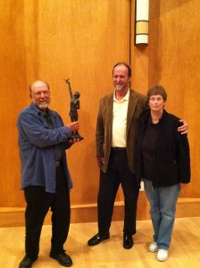 Gary and Karen Lee with sculptor Lewis Bryden (center)