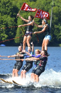 Alex Hanlon & Lilly Hanlon hold up Tory Harrington, while Ali Burrows & Maris Van Slyke hold up Leah Marsack in this double pyramid Photographed by Herbert Munk