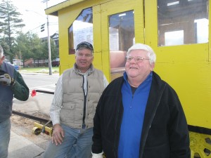 In this file photo from 2008, Bob Lowenberg, right, helped dismantle Jon Martin’s railcar exhibit that had been displayed that year on the Goodsell Museum’s front yard.
