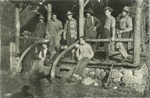 After Lunch at the Hatchery, Adirondack League Club Yearbook, 1907. Standing on porch (L to R): John Stell, Mr. Walker, Mel Olney, Jim Dalton, Roy G. Crego, and Frank Holmes. Seated at right: L. Smith.