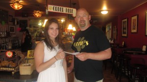 Sara Dempsy and Eric Sutherland,  owner of Ozzie’s Coffee Bar in Old Forge.  Photo by Gina Greco