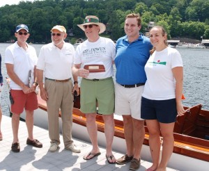 “Omeco,” a 25-ft. Fay & Bowen owned by Bill and Wendy Nolan, received a special 100th birthday award. Omeco has spent her entire 100 years in the same boathouse with the same family at the PAOWNYC property on Fourth Lake. Courtesy photo