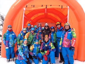 Paul Van Slyke (in black in the middle of the photo) with other members of the U.S. Ski Association at Sochi Ru.