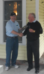 FCLA Board Member Tom McCabe, right, presents the Outstanding Service Award to out-going President Jim Murphy. Courtesy photo