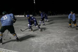Some nighttime hockey action during last weekend’s Adirondack Ice Bowl. 