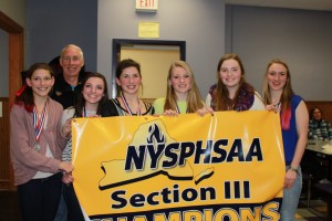 Coach John Leach with, from left, Laura Levi, Allyson Brosemer, Rachel Smith, Emily Greene, Olivia Phaneuf and Megan Greene. The entire Old Forge girls team made the New York State team. Courtesy photo