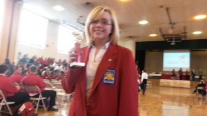 Mary Roach displays her first place award.