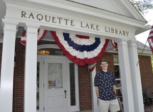 Kyle Cappelletti, a high school junior, organized the Raquette Lake Library fundraising event on July 4th. Photo by Carolynn McCann