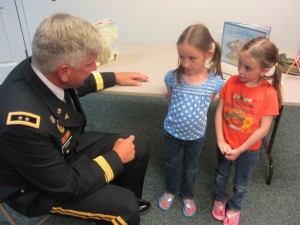 Retired Army Major General Russell J. Czerw and Elsa and Heidi Klaiber. Photos by Gina Greco