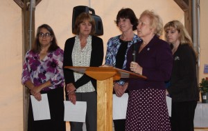 Karen Beck, far left, is recognized for her certification by Program Director Linda Martin, of Big Moose. Photo by Albert Worthen